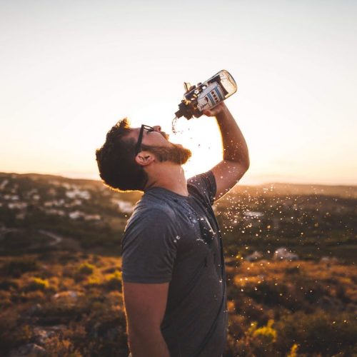 Man drinking water. Why Hydration Is Crucial.