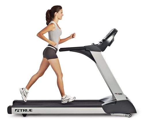 How To Burn More Calories During Your Run. Running on a treadmill.