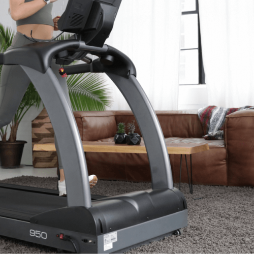 Woman Running On TRUE® S.O.F.T System Soft Select Treadmill. An orthopedically correct treadmill.