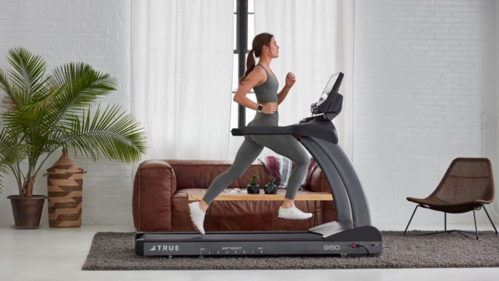 Woman running on TRUE Performance 800 Treadmill