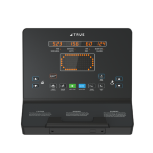 Close-up of a digital treadmill control panel displaying workout stats like time, distance, watts, METs, heart rate, and calories. The panel includes various buttons and indicators for workout adjustments.
